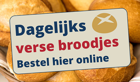 A sign in Dutch reads Dagelijks verse broodjes Bestel hier online against a background of bread rolls.